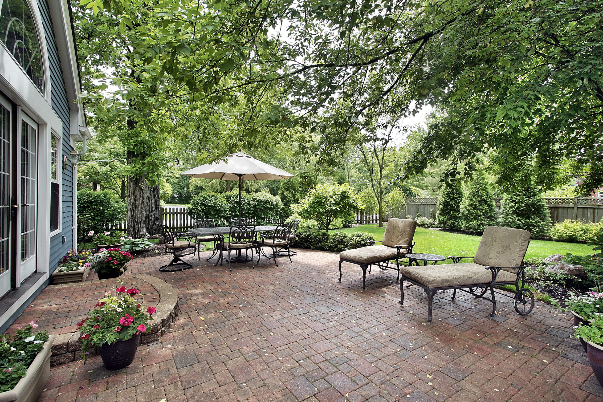 5 Tips For How To Upgrade Your Patio With A Quality Floor Coating suburban home brick patio